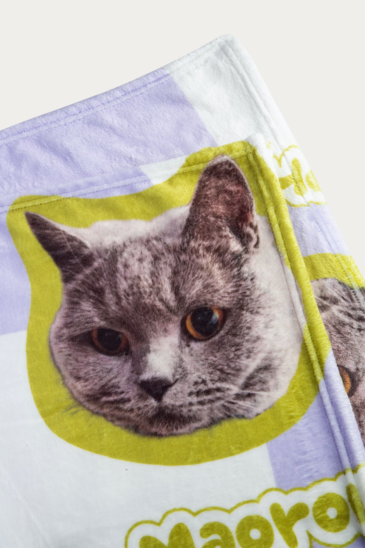 Handkerchief with a cat face design on a white background