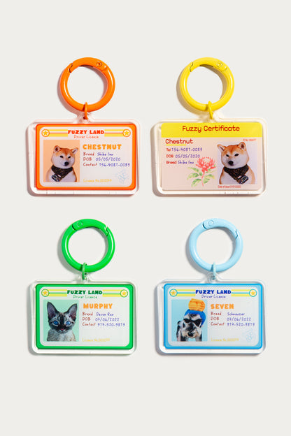 Four colorful pet ID card holders with different animals on a white background