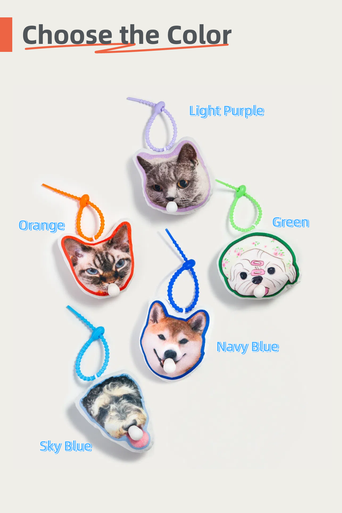 Cat-themed keychains in various colors on a white background