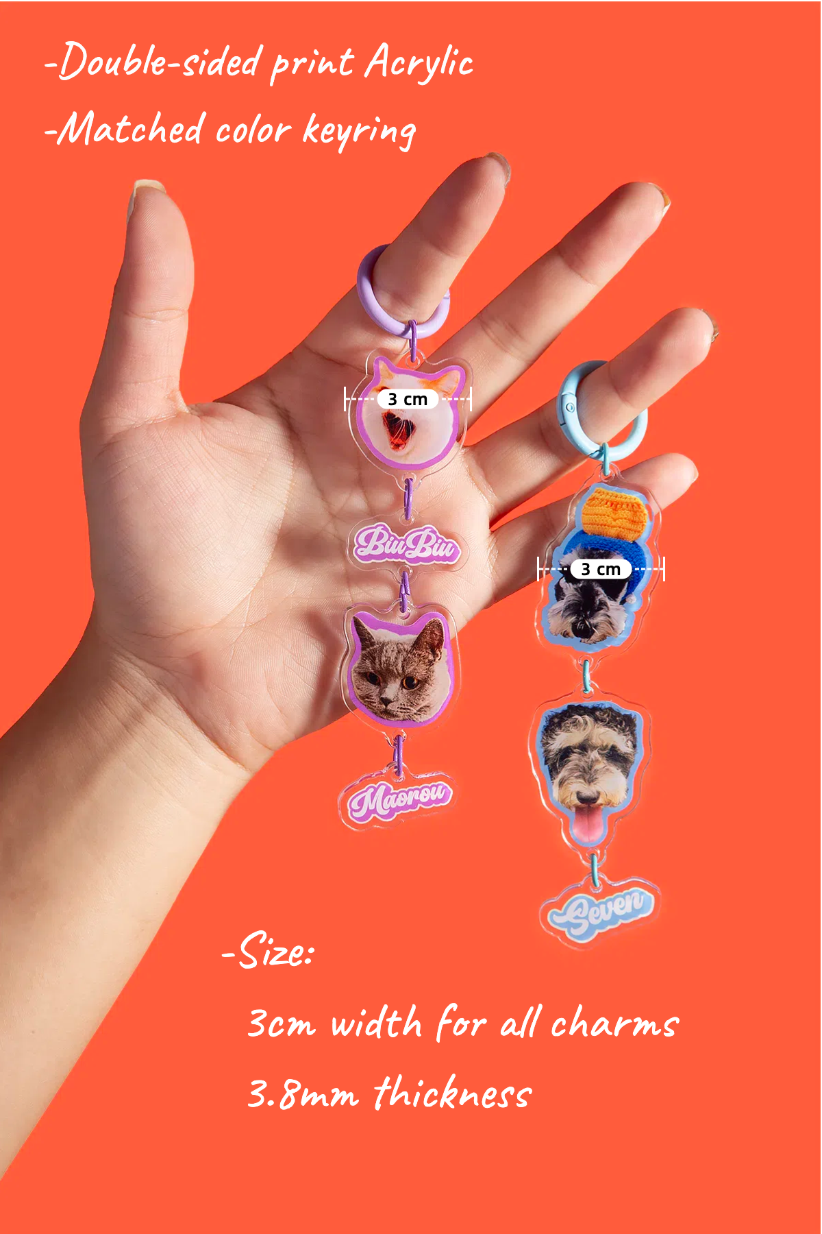 Hand holding three colorful keychains with measurements on an orange background