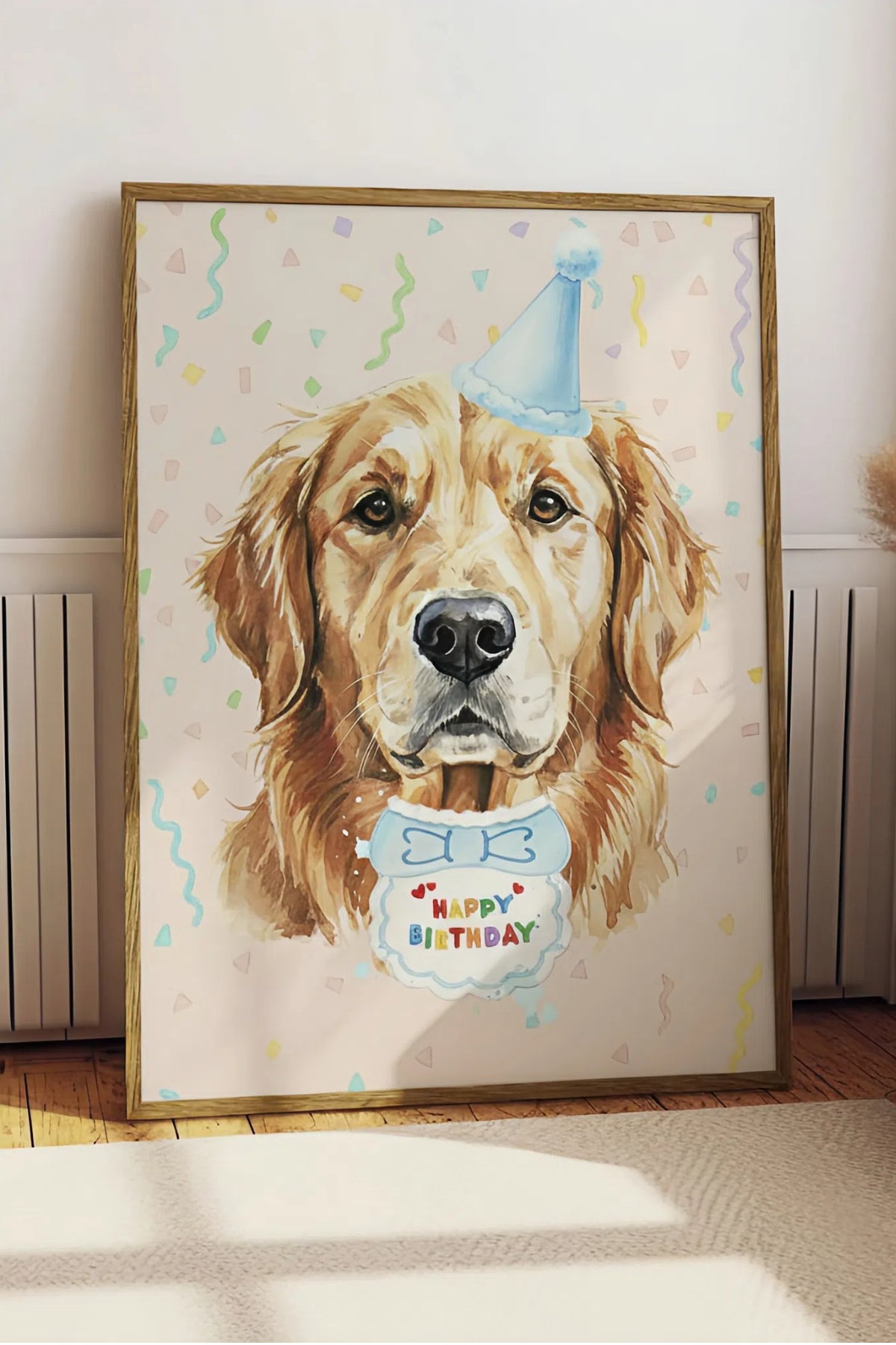 Framed artwork of a dog wearing a birthday hat with 'Happy Birthday' text on a light background.
